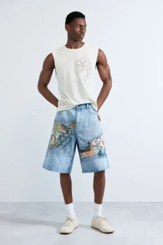 Bermuda in denim con toppe