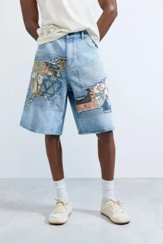 Bermuda in denim con toppe
