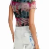 Body in tulle fantasia a maniche corte Body in tulle fantasia a maniche corte