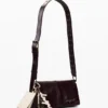 Borsa a tracolla piccola lucida Borsa a tracolla piccola lucida
