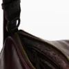 Borsa a tracolla piccola lucida Borsa a tracolla piccola lucida