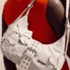Borsa con applicazioni floreali