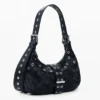 Borsa con borchie in rilievo