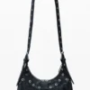 Borsa con borchie in rilievo