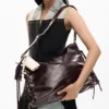 Borsa grande lucida intrecciata