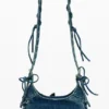Borsa in denim con applicazioni