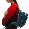 Borsa in denim con applicazioni