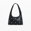 Borsa in ecopelle con borchie