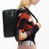 Borsa media con ricamo