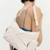 Borsa media intrecciata con logo