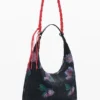 Borsa ovale media con texture