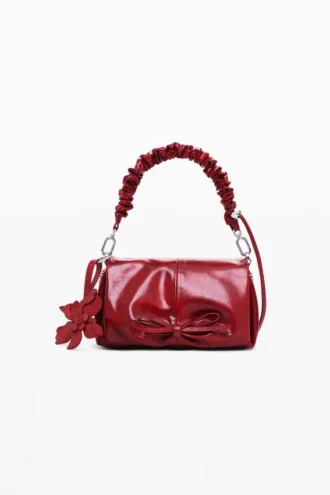 Borsa piccola con fiocco lucido