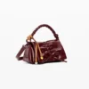 Borsa piccola con fiocco lucido