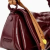 Borsa piccola con fiocco lucido