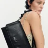 Borsa piccola con patta ricamata Borsa piccola con patta ricamata