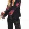 Camicetta con fiori pixelati