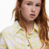 Camicia a quadri con volant Camicia a quadri con volant
