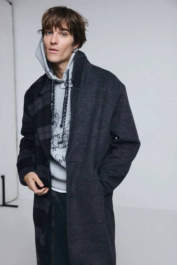 Cappotto a quadri bimateriale in lana Cappotto a quadri bimateriale in lana