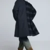 Cappotto a quadri bimateriale in lana Cappotto a quadri bimateriale in lana