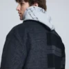 Cappotto a quadri bimateriale in lana Cappotto a quadri bimateriale in lana