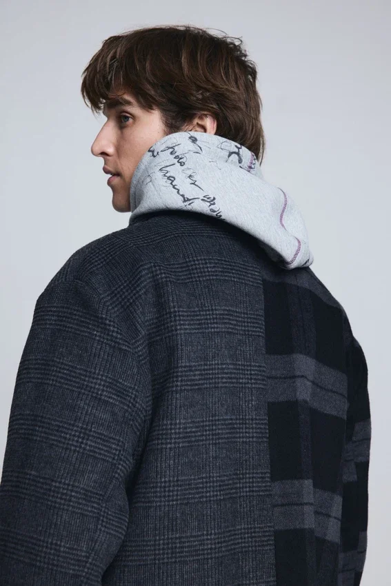 Cappotto a quadri bimateriale in lana Cappotto a quadri bimateriale in lana