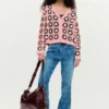 Cardigan rosa all’uncinetto
