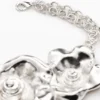 Cintura con fiori metallici