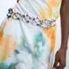 Cintura con fiori metallici