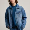 Giacca in denim con toppe Giacca in denim con toppe