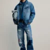Giacca in denim con toppe Giacca in denim con toppe