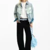 Giacca in denim con toppe Giacca in denim con toppe