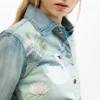 Giacca in denim con toppe Giacca in denim con toppe