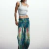 Jeans a zampa con effetto splatter