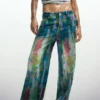 Jeans a zampa con effetto splatter