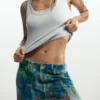 Jeans a zampa con effetto splatter