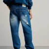 Jeans con toppe