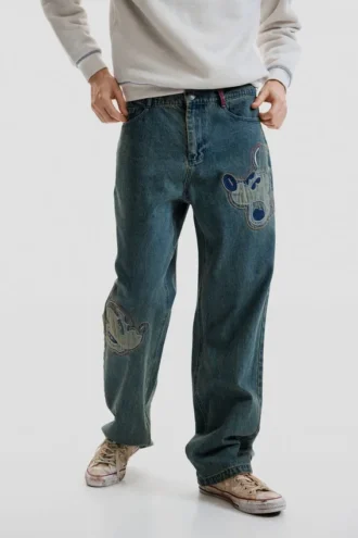 Jeans con toppe Disney™