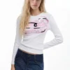 Maglietta a maniche lunghe con lettere rosa