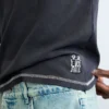 Maglietta con spalline e logo