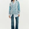 Maglione con scollo a V e stampa astratta