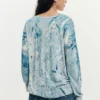 Maglione con scollo a V e stampa astratta