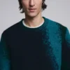 Maglione jacquard con effetto spruzzato Maglione jacquard con effetto spruzzato
