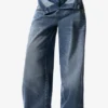 Pantaloni in denim con doppia cintura Masha Popova
