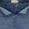 Pantaloni in denim con doppia cintura Masha Popova