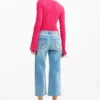 Pantaloni in denim con toppe all’uncinetto