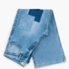 Pantaloni in denim con toppe all’uncinetto
