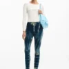 Pantaloni in denim tie-dye