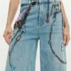 Pantaloni jeans con catene