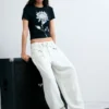 Pantaloni larghi con bottoni