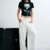 Pantaloni larghi con bottoni
